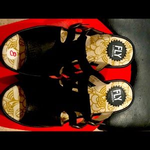 Fly London slides with wedge heel . Comfy, versatile, adjustable straps